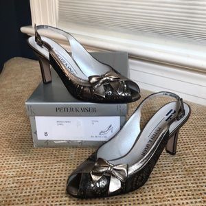 Never worn bronze/black sling back heels
